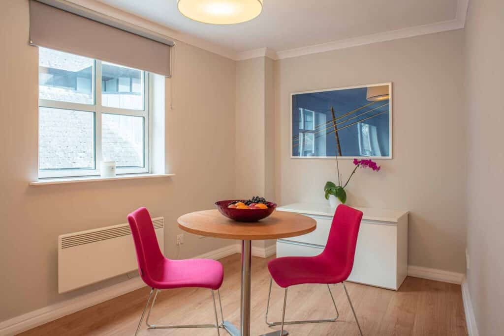 Dining table in apartment at PREMIER SUITES Reading