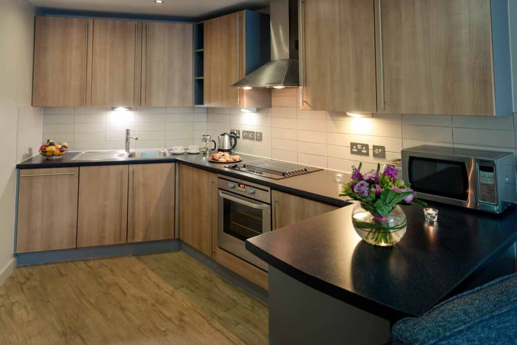 Large kitchen with all appliances and equipment at PREMIER SUITES Liverpool
